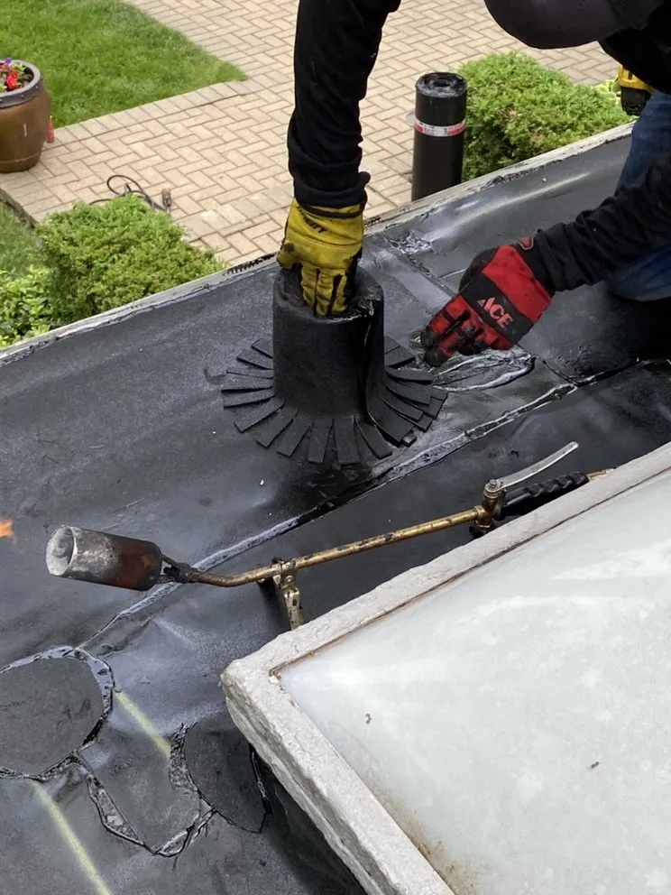 Slide of Mikes Flat Roofing Services