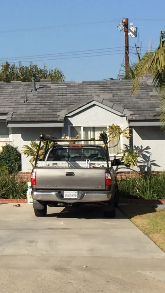 Slide of Mike's Reasonable Roofing