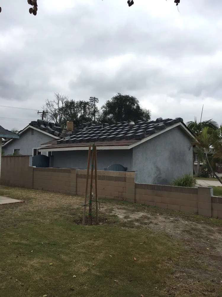 Slide of Mike's Reasonable Roofing