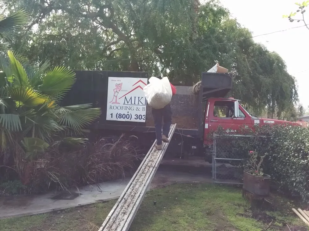 Slide of Mike's Roofing & Building