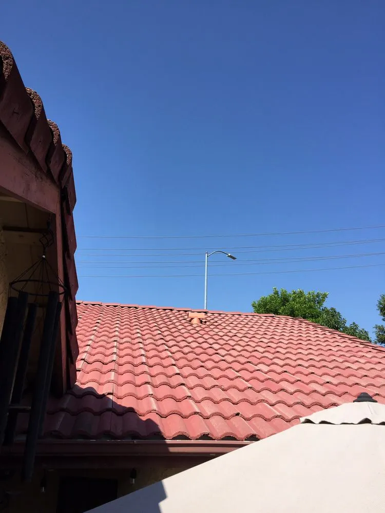 Slide of Mike's Roofing & Building