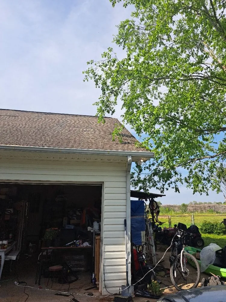 Slide of Mike's roofing and repairs