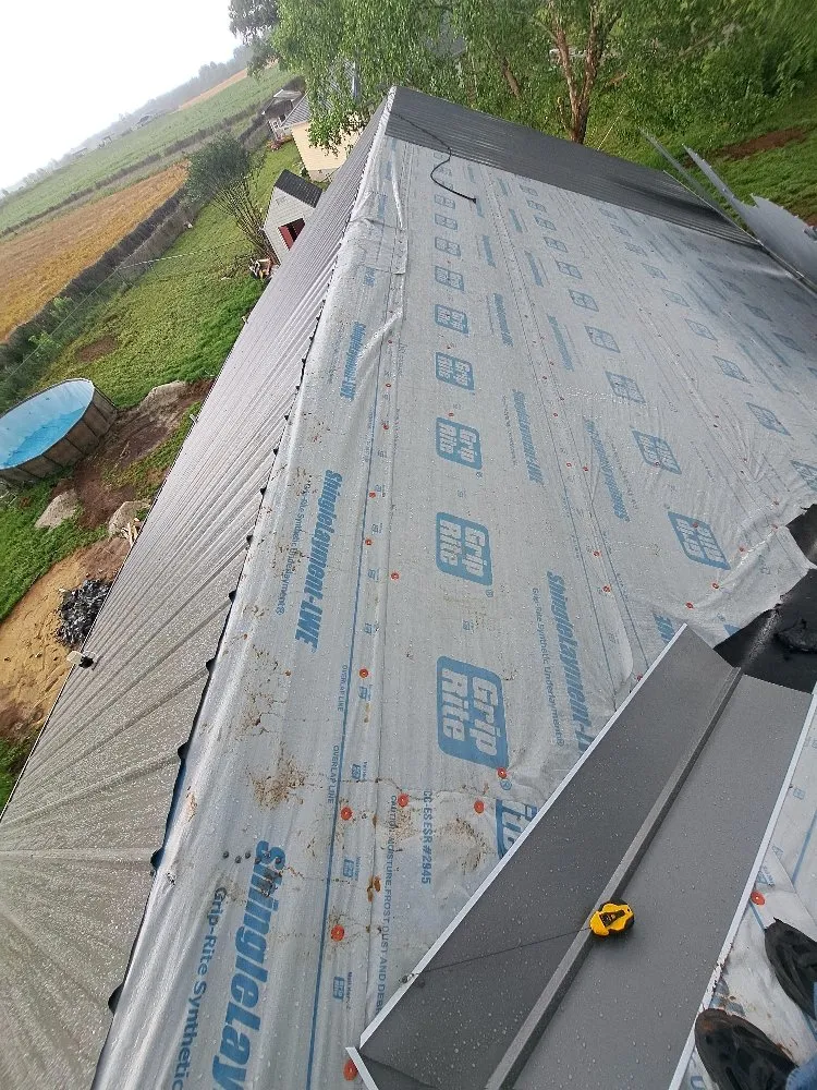 Slide of Mike's roofing and repairs