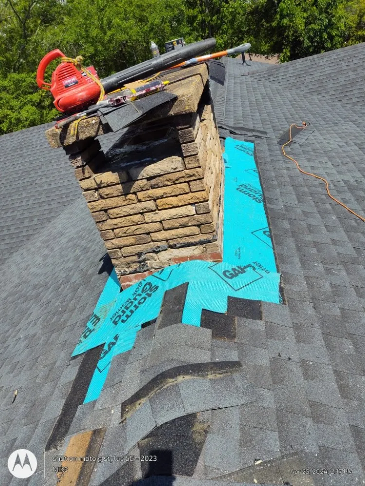 Slide of Mike's roofing and repairs