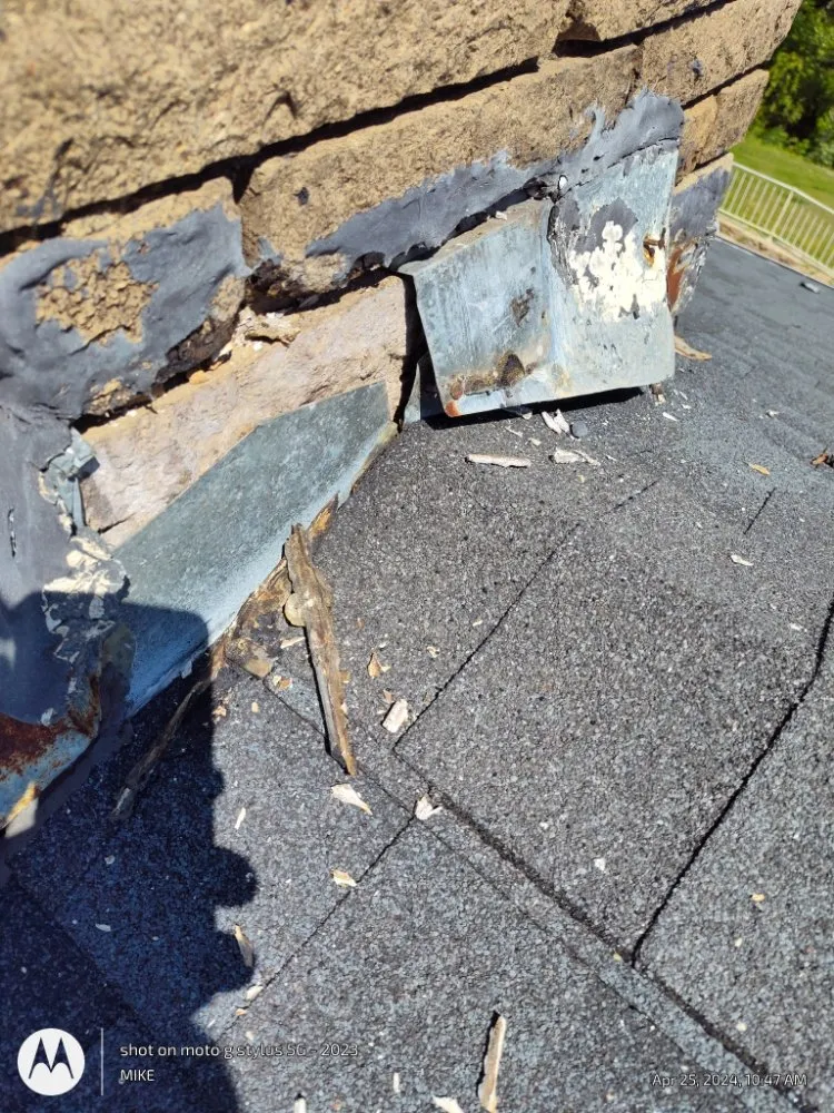 Slide of Mike's roofing and repairs