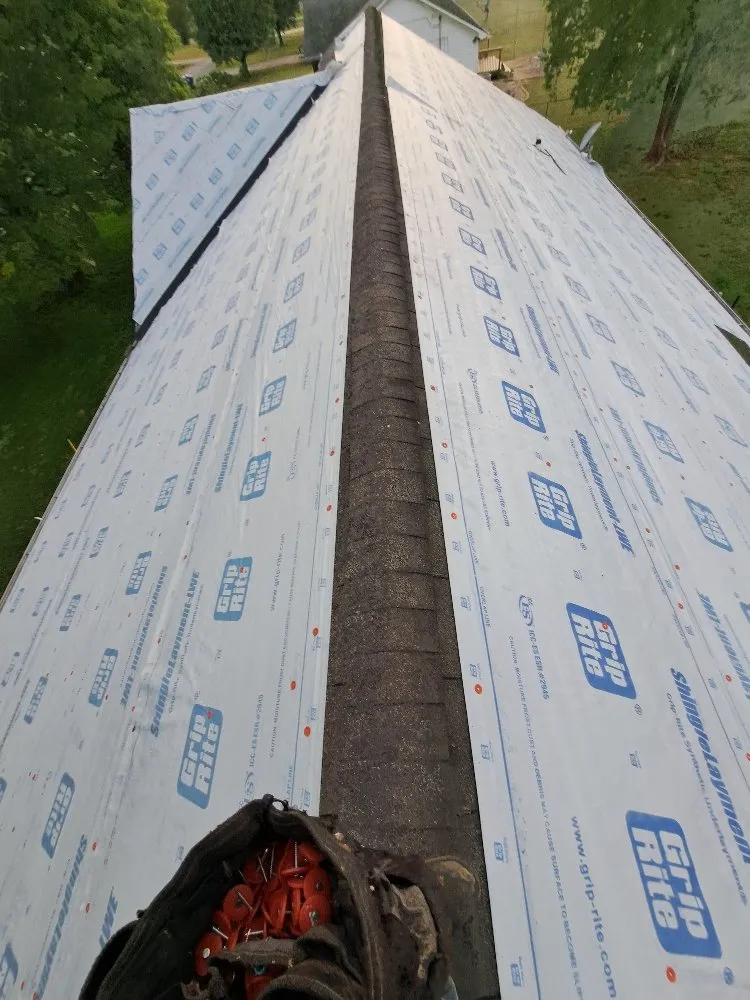 Slide of Mike's roofing and repairs