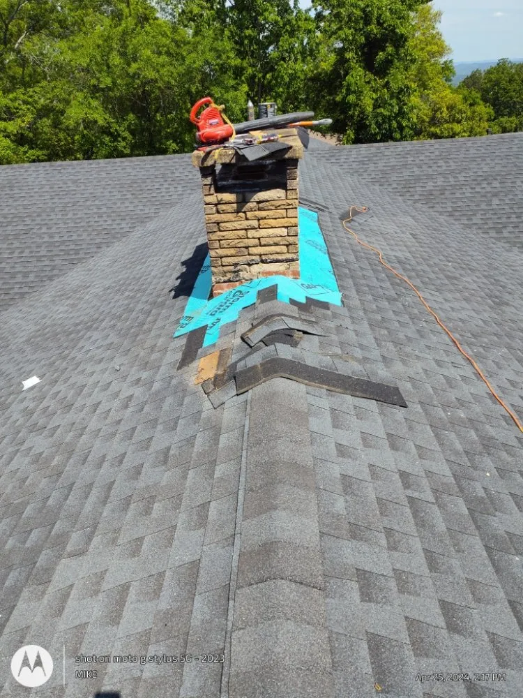Slide of Mike's roofing and repairs