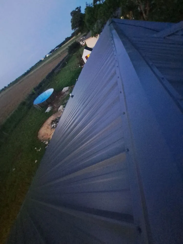 Slide of Mike's roofing and repairs