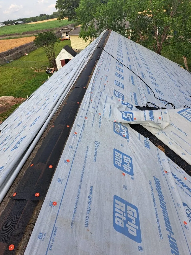 Slide of Mike's roofing and repairs