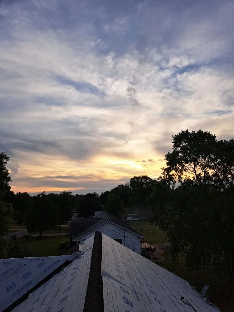 Slide of Mike's roofing and repairs