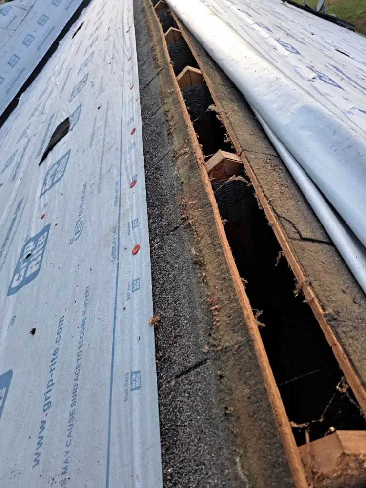 Slide of Mike's roofing and repairs