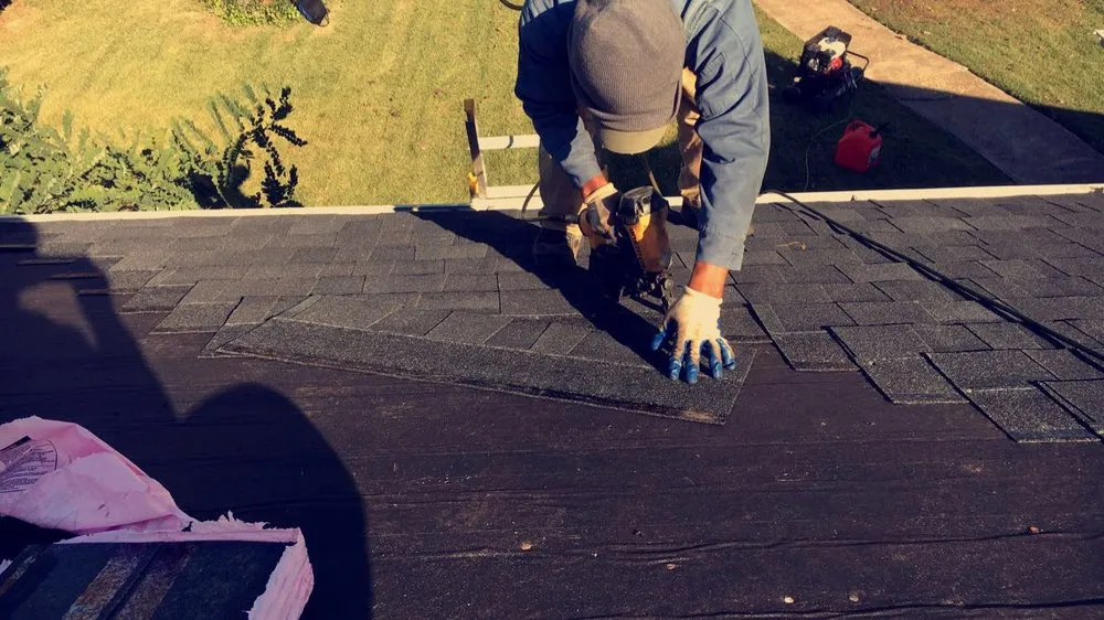 Slide of Mike's Roofing Company