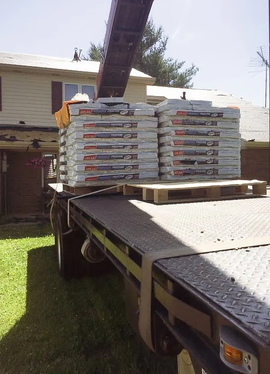 Slide of Mike's Roofing Company