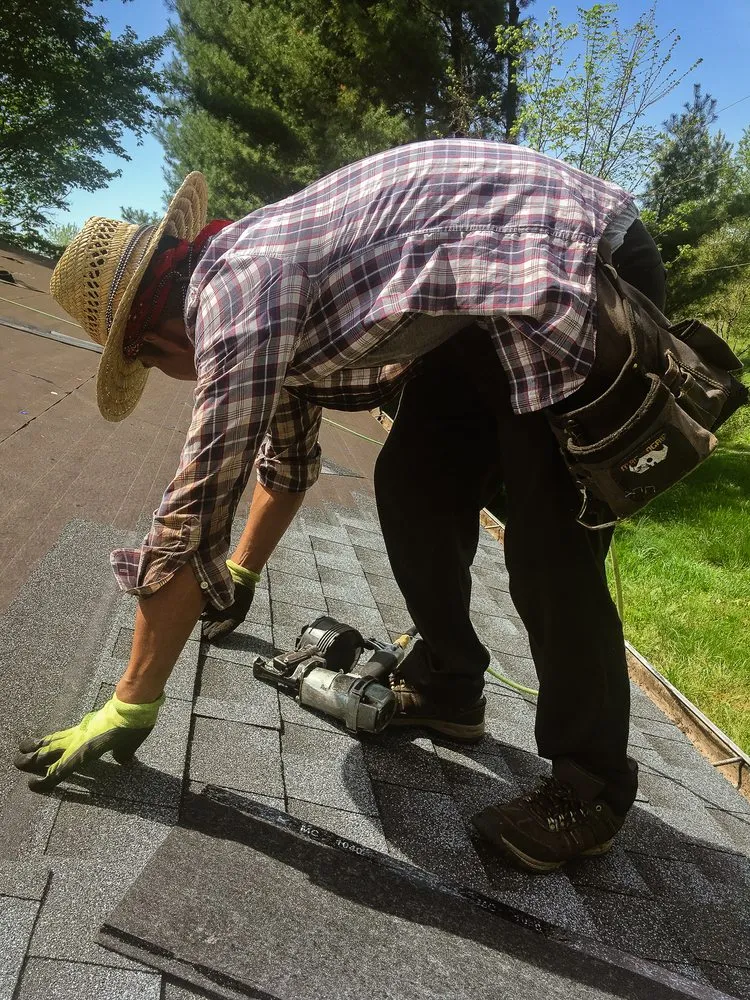 Slide of Mike's Roofing Company