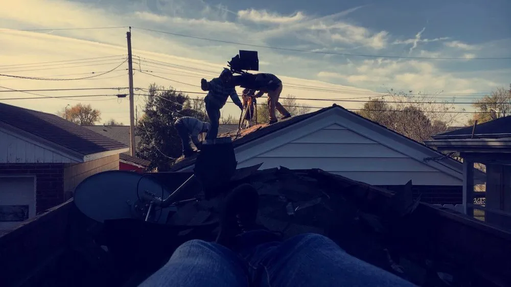 Slide of Mike's Roofing Company