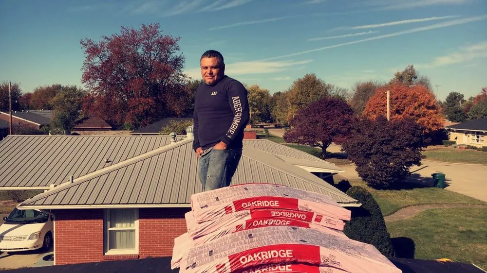 Slide of Mike's Roofing Company