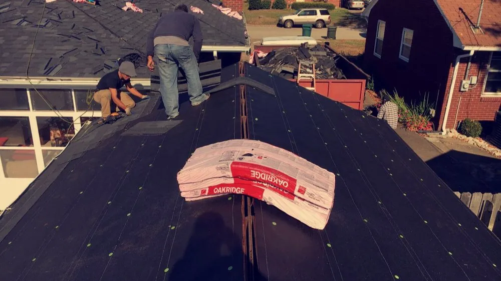 Slide of Mike's Roofing Company