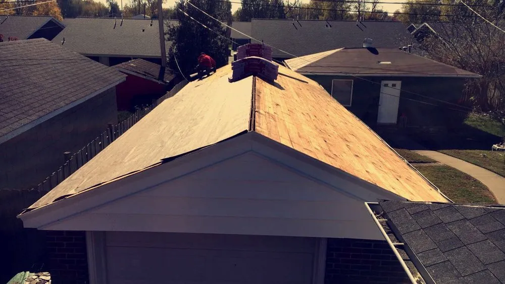 Slide of Mike's Roofing Company