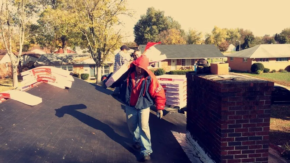 Slide of Mike's Roofing Company
