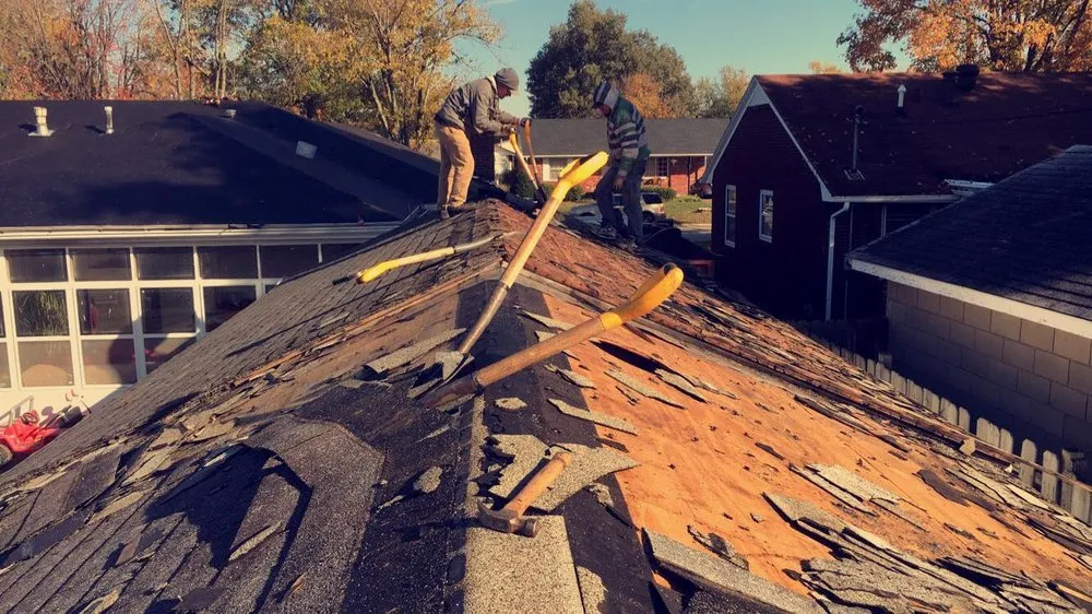 Slide of Mike's Roofing Company