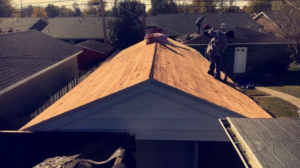 Slide of Mike's Roofing Company