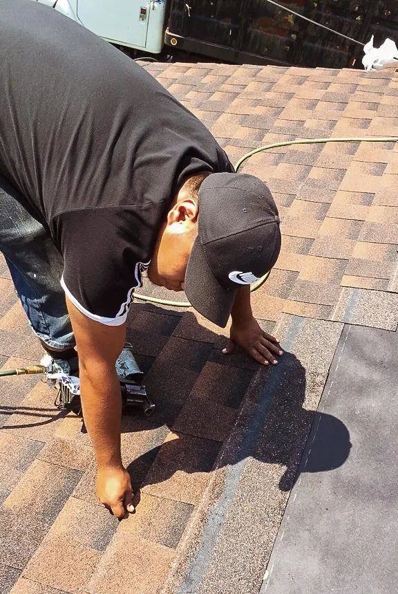 Slide of Mike's Roofing Company