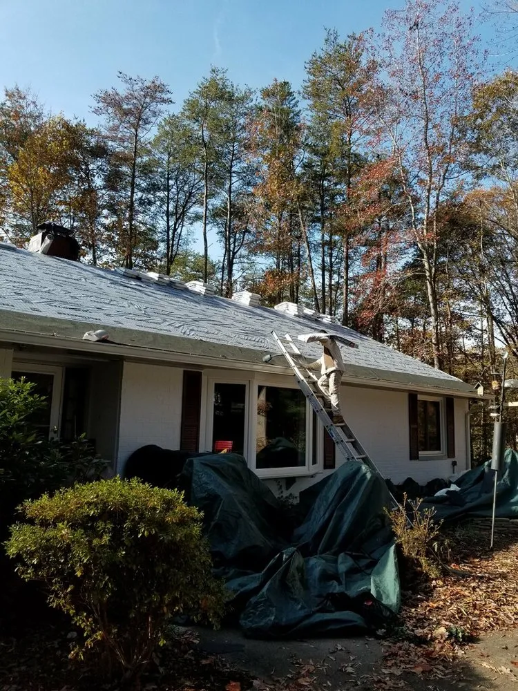 Slide of Mike's Roofing