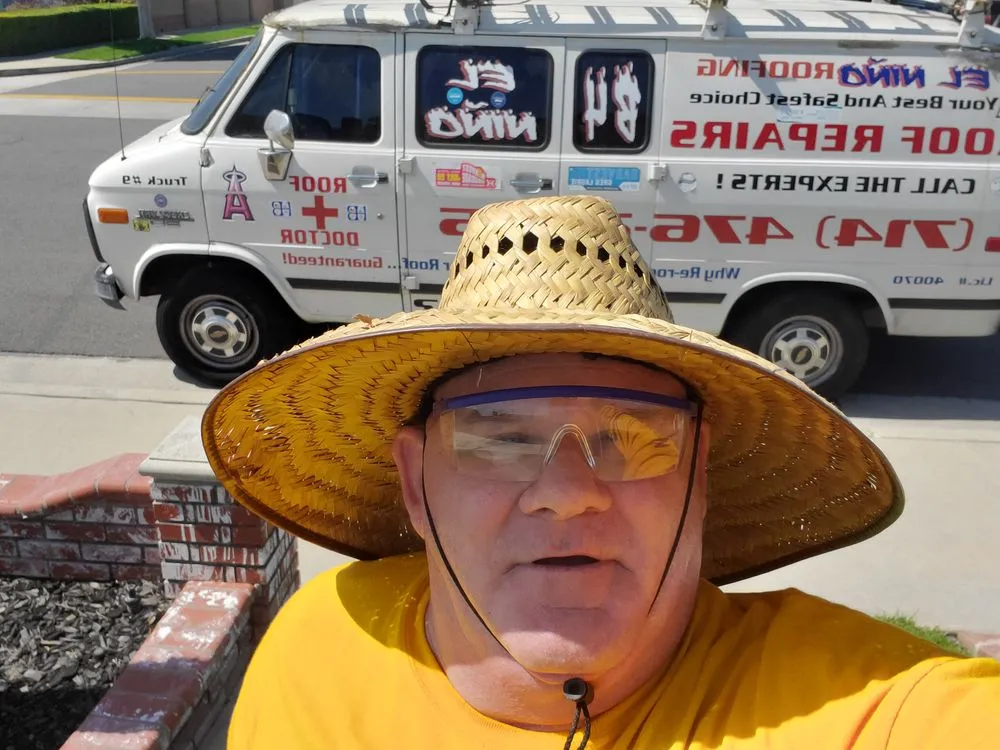 Slide of Mikes Roofing