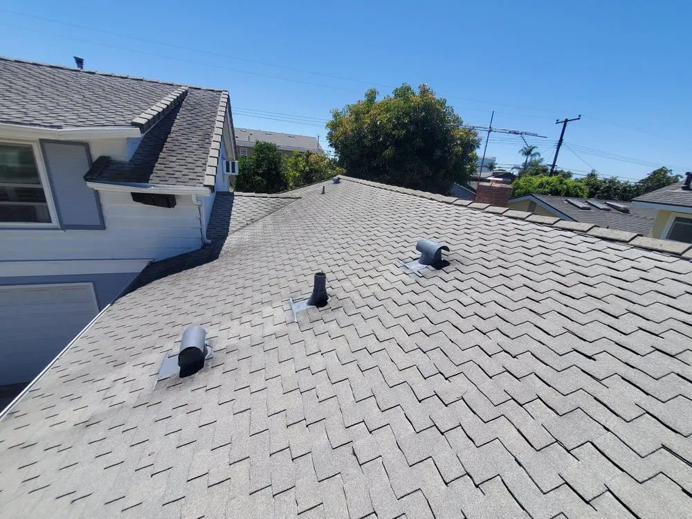 Slide of Mikes Roofing