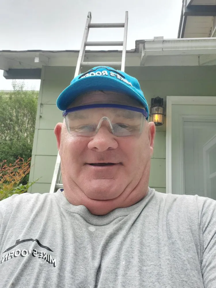 Slide of Mikes Roofing