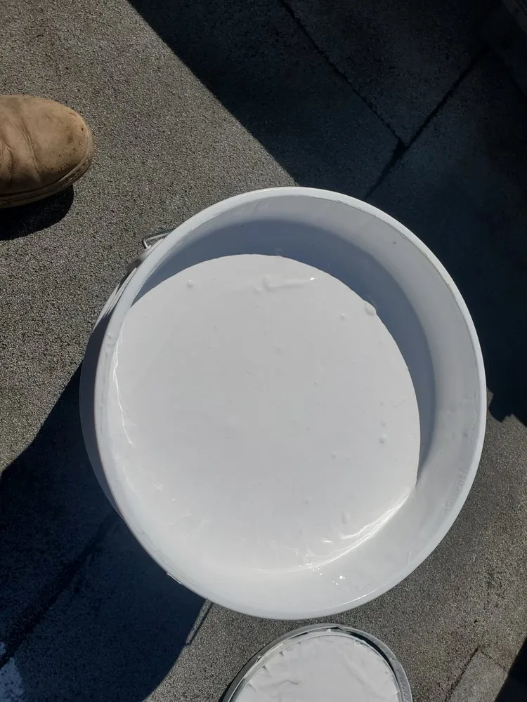 Slide of Mikes Roofing