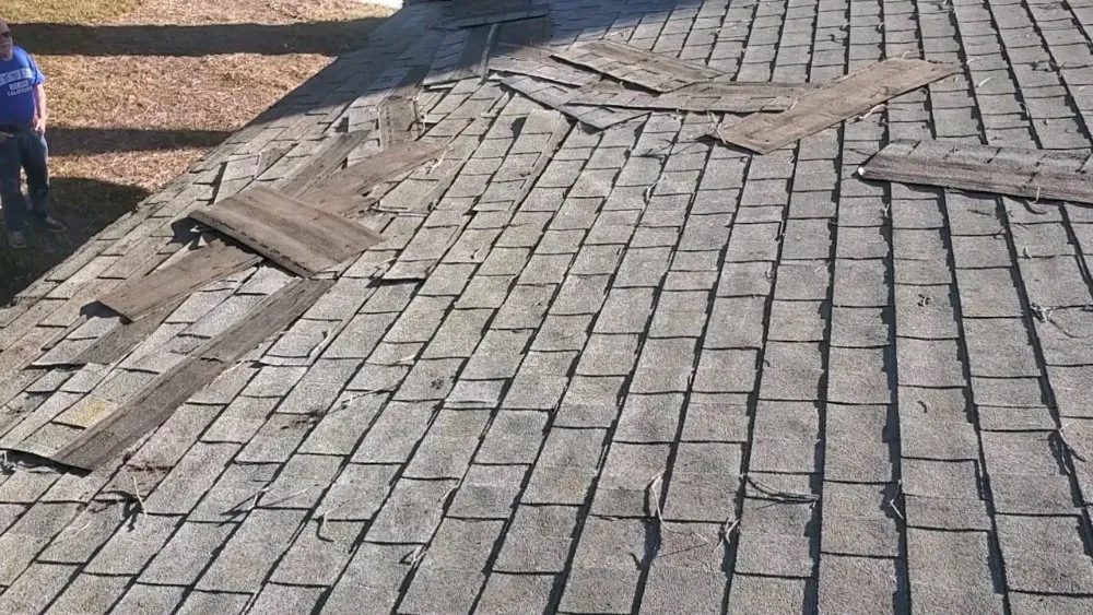 Slide of Mikes Roofing