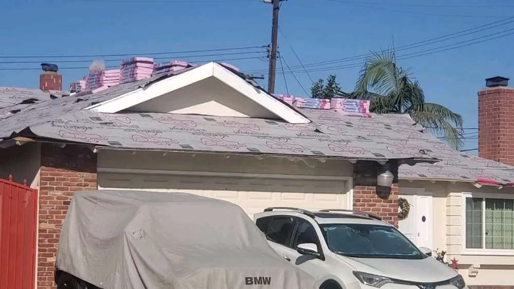 Slide of Mikes Roofing