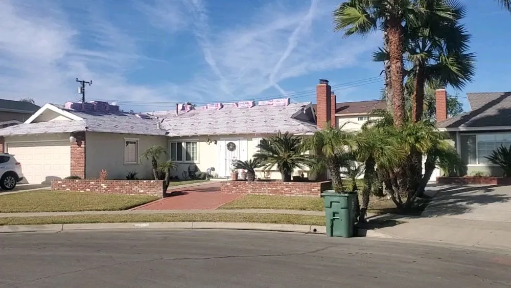 Slide of Mikes Roofing