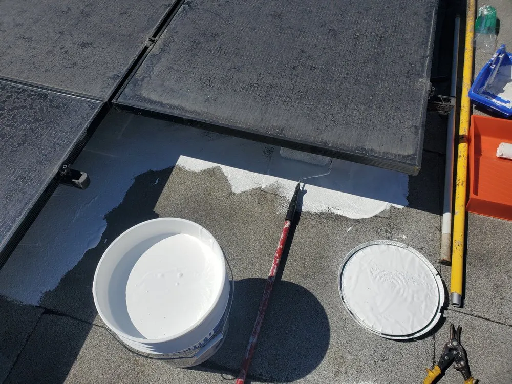 Slide of Mikes Roofing