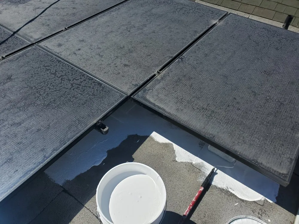 Slide of Mikes Roofing