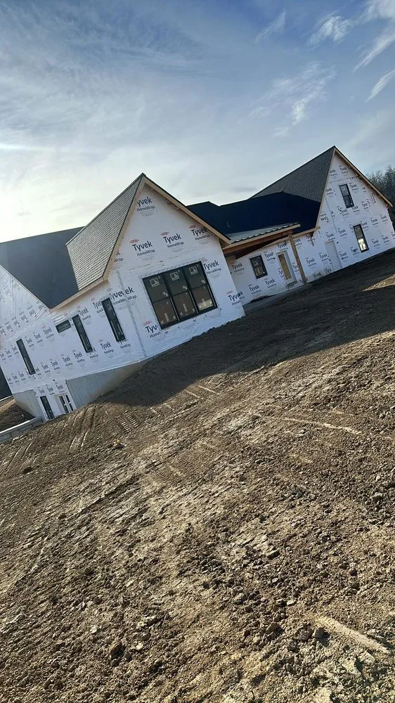 Slide of Mikes Roofing