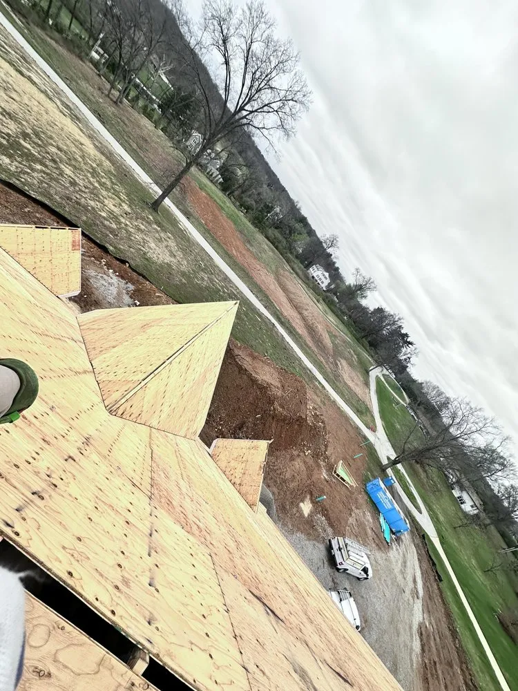 Slide of Mikes Roofing