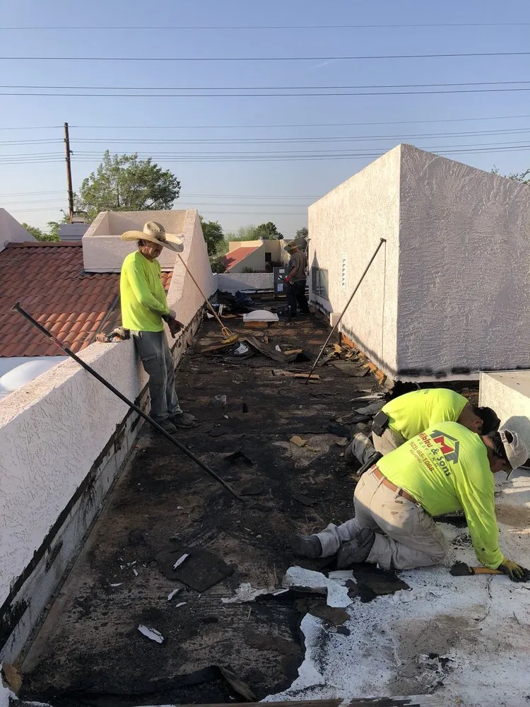 Slide of Mikku & Sons Roofing