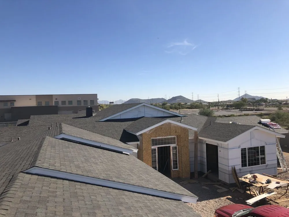 Slide of Mikku & Sons Roofing