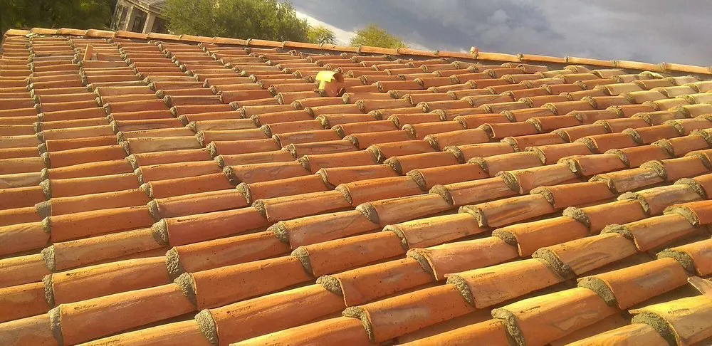 Slide of Mikku & Sons Roofing