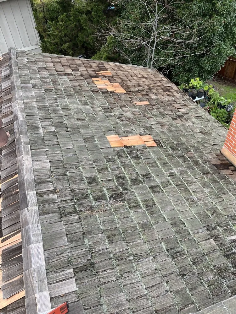 Slide of Milan Roofing