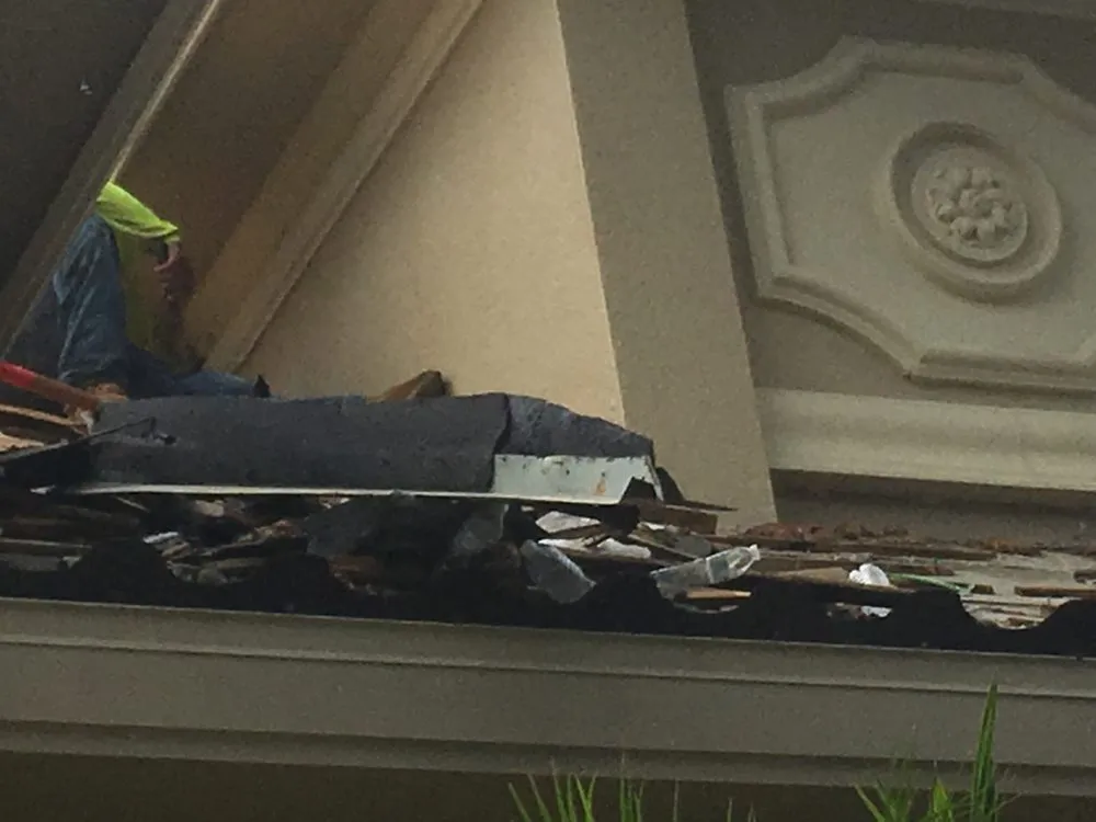 Slide of MilBar Construction and Roofing