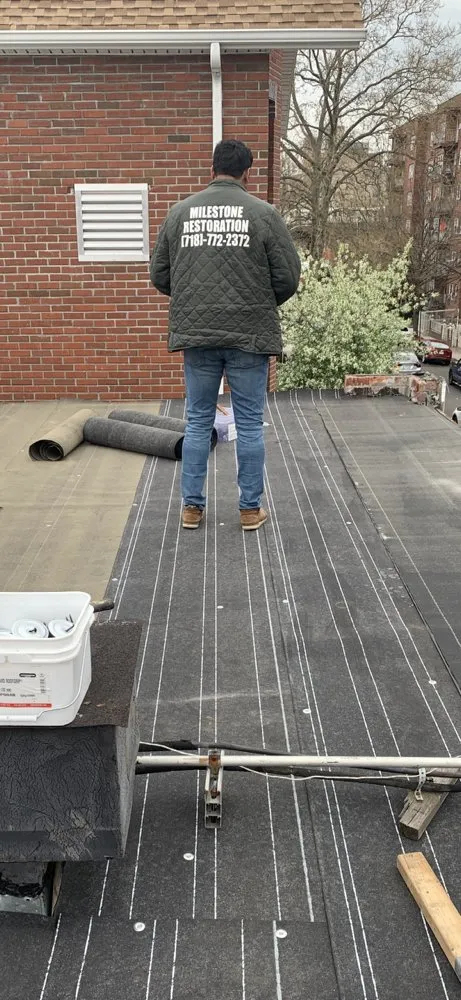 Local roof replacement after storm damage in South Richmond Hill, NY by Milestone Restoration