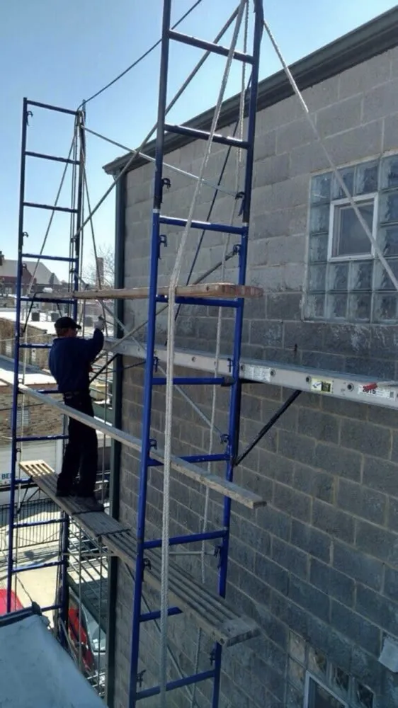 Expert storm damage roof repair in South Richmond Hill, NY by Milestone Restoration