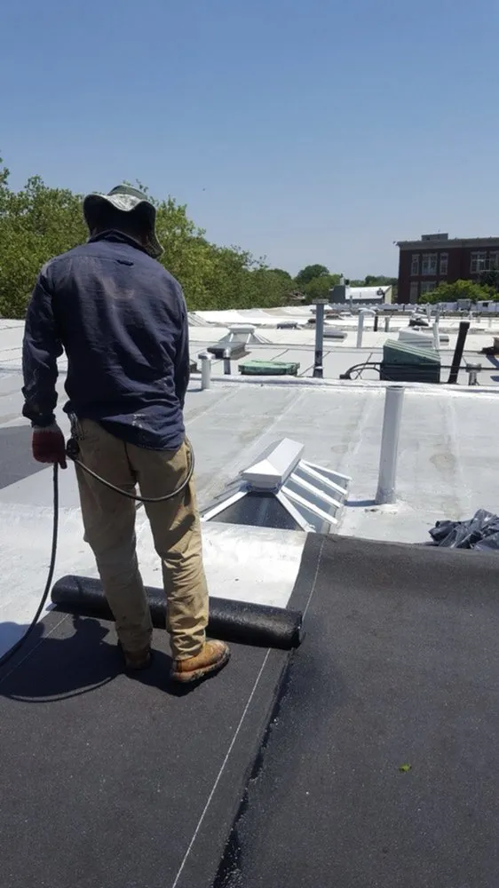 Licensed shingle roofing service with free inspection in South Richmond Hill, NY by Milestone Restoration