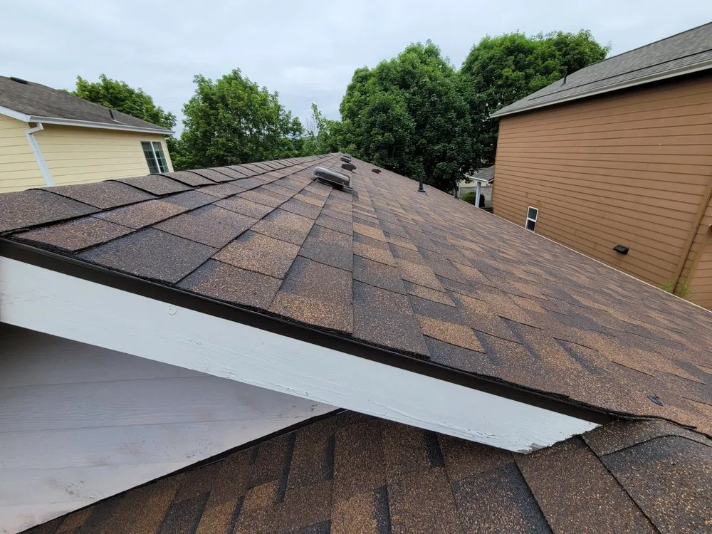 Slide of Milian Roofing