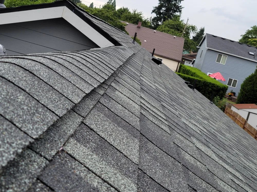 Slide of Milian Roofing