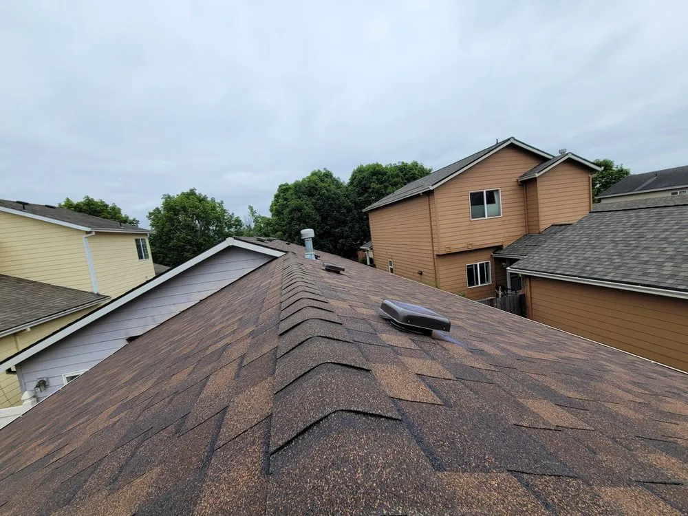 Slide of Milian Roofing