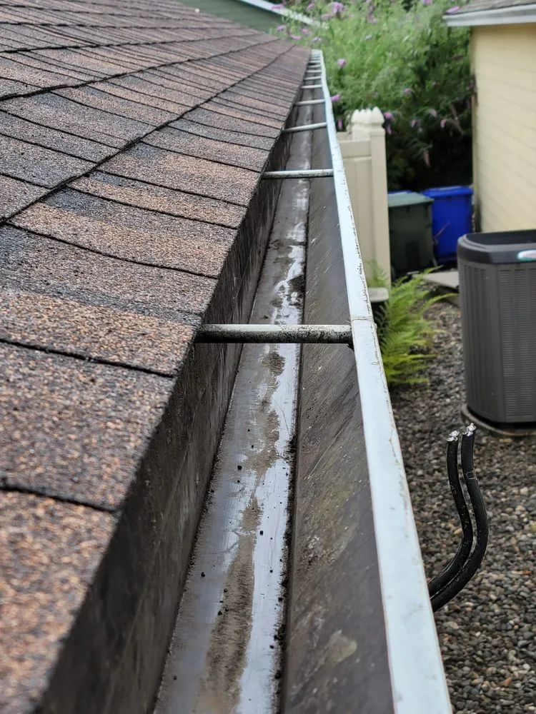 Slide of Milian Roofing